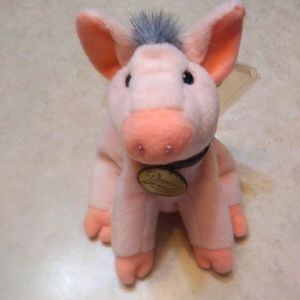 It's "Babe" the sheep pig from the 1997 movie!